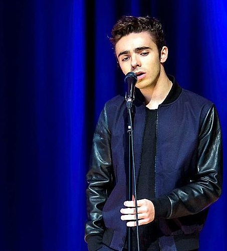 Nathan sings at Newman College.
