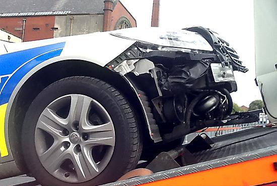 Damage to the police car

