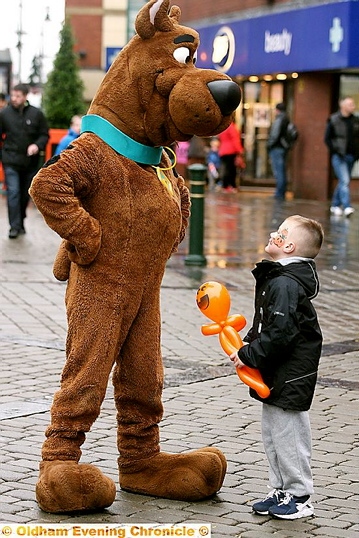 Regan James Turner (five) has a close encounter with Scooby Doo
