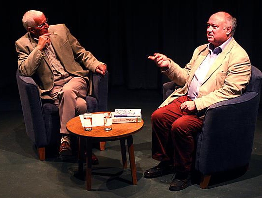 Ian Perks (left), Saddleworth Players member and library enthusiast, in conversation with author Louis de Bernieres