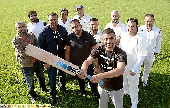 Co-organiser Faisal Hussain (with bat) is pictured with some of the players.