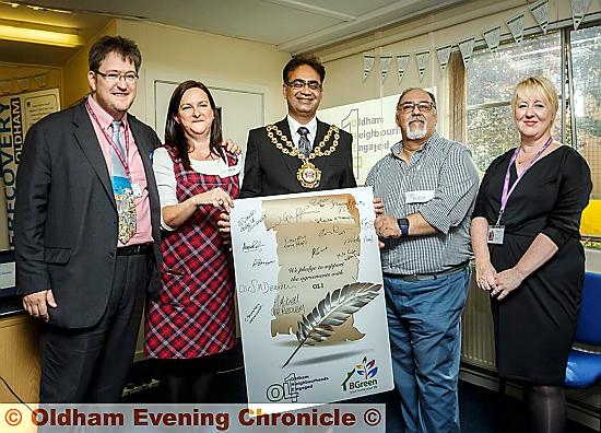 PLEDGE for the future . . . Mark Drury (NHS Oldham CCG), Maxine Moar (Moar Communities), Mayor of Oldham, Councillor Ateeque Ur-Rehman, Andy Gregori (OL1 Group) and Joanne Griffin (First Choice Homes Oldham)
