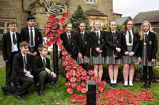CROMPTON House pupils with their memorial.