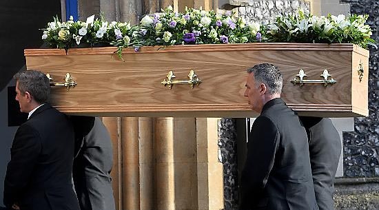 The coffin of former Labour MP Michael Meacher is carried into St Mary's Church in Wimbledon, London, ahead of his funeral.