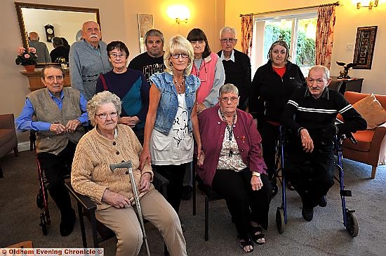 Residents at St. Margaret's Gardens, Hollinwood complaining about heating costs. Pic shows Julie Baker (standing, centre).