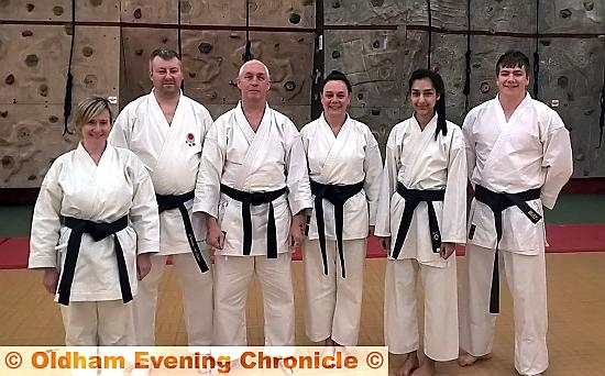 HARD WORK PAYS OFF . . . pictured (left to right) are Diane O’Brien, Darren Bates (third Dan), Fred Jones (club instructor), Dot Crossley, Rabhia Ali and James Marland.