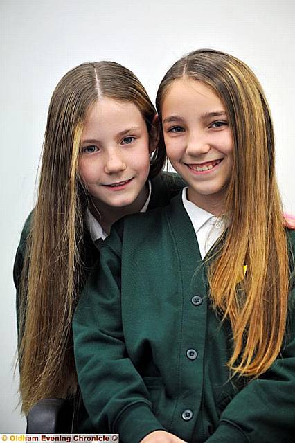 Paige Hamilton (10) and Olivia Hamilton (9) are getting their hair cut for charity. It will be made into wigs.

PIC shows Olivia (left) and Paige.