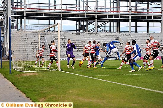 George Elokobi’s goal. Pictures by ALAN HOWARTH and PRESS ASSOCIATION
