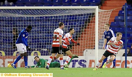 OH, NO . . . Athletic are robbed of a deserved victory by the goal of Doncaster’s Jamie Coppinger (right) in the final minute of injury time.
