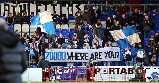 SENDING out a message . . . fans display a banner in the Chaddy End