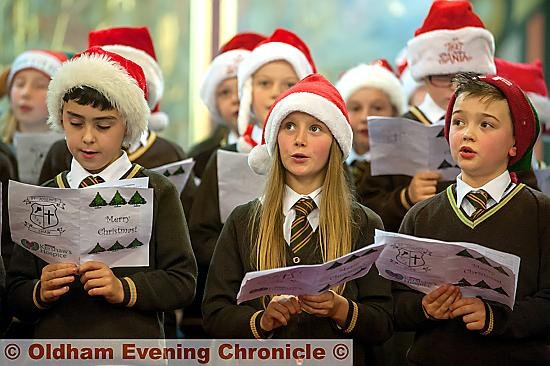 ANGELIC: l-r Ben Slater, Polly Balmforth-Beever and Kavanagh Warner sing for St Joseph's RC primary school at the Kershaw’s concert.