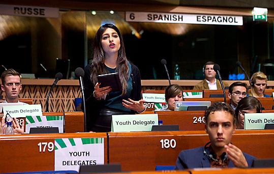 Oldham youth councillor Mariam Waseem speaks in a debate in Strasbourg.