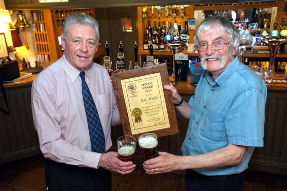 CHEERS . . . landlord Ray Hicks (left) with Graham Chinn from CAMRA