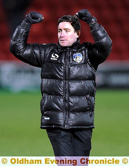 WHAT A RELIEF . . . manager Lee Johnson celebrates “ a satisfying victory for everyone.”