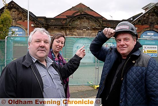 Heritage stones on Royton Baths to be saved and restored.

PRESERVATION plans . . . Dale Hughes (D Hughes Demolition), right, and Councillors Marie and Steven Bashforth