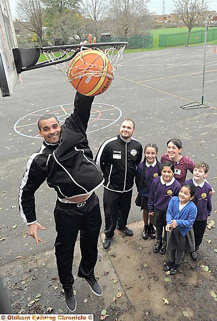 High flyers: Sam Attah (front) and David Credgington with teacher Michelle Hill and pupils (from the left) Akeela Yousar, Emaan Ashraf, Madiha Begum and Ewan Horner. 
