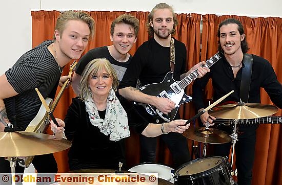 GOING out with a bang: Mrs McCormick with The Visitors (from the left) Charles Cotton, Jonny Wray, Jack Bottomley-Clift and Greg Higham