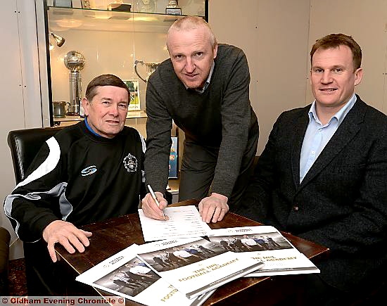SIGNED UP: Mossley directors Steve Tague (left) and Harry Hulmes (centre) are joined by Darren Royle, director of the new Evo-Stik Northern Premier League Football Aacdemy.