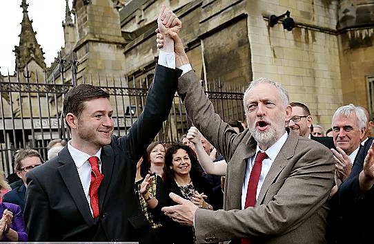 Labour leader Jeremy Corbyn (right) welcomes newly elected Oldham West and Royton MP, Jim McMahon to the House of Commons