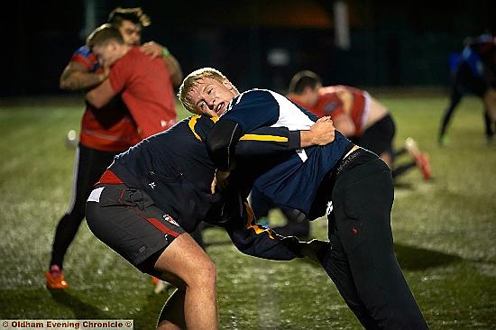 HOLD ON TIGHT: George Tyson and his Oldham RL team-mates have gone through a tough pre-season training schedule.