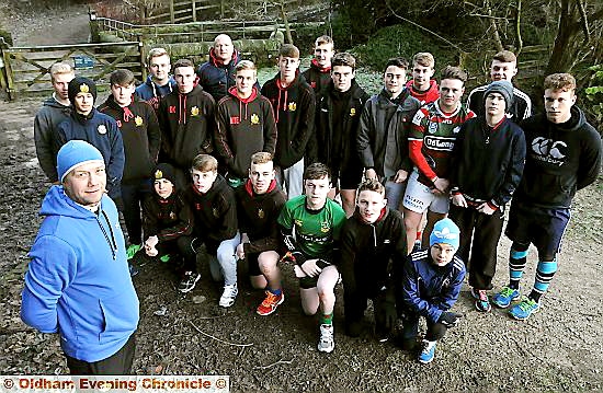 Keith Brennan with his fellow coaches and players from Waterhead under-15s, who are heading to Bath this weekend.