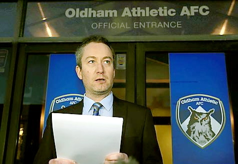 Neil Joy reads out the club’s official statement about the Evans affair