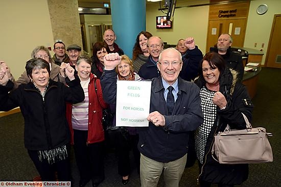 WE did it: local residents including Trevor Cash and Martina Hanson (front) are all smiles after the application was thrown out