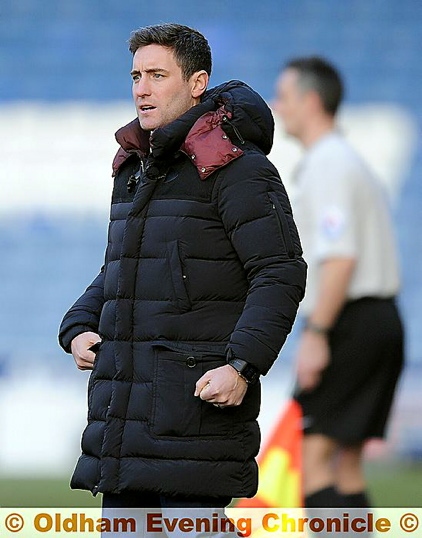 UNHAPPY VIEWING . . . a frustrated Lee Johnson watches from the sidelines.