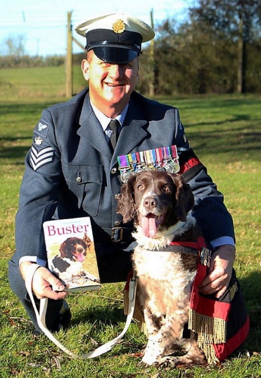 Buster the hero dog with Michael and their new book