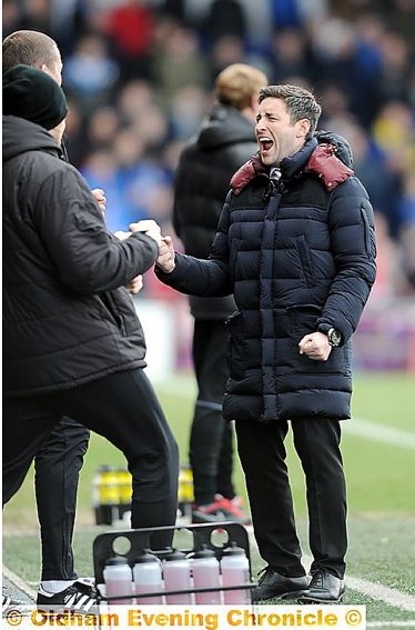 THAT WINNING FEELING: Lee Johnson turns to his hecklers to celebrate Barnsley’s win.