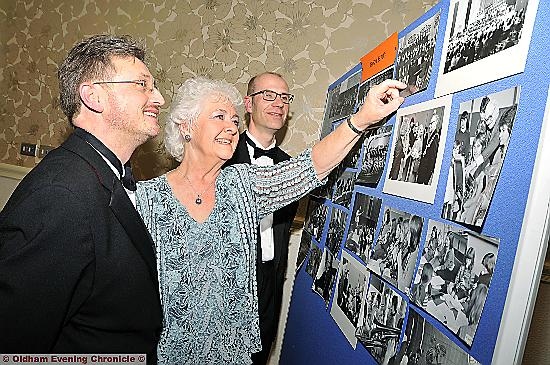 PHOTOGRAPHIC memories: Music Service director Gerard Booth, Dr Eileen Bentley and Music Service deputy director Jonathon Leedale look at the display to celebrate the golden anniversary. 