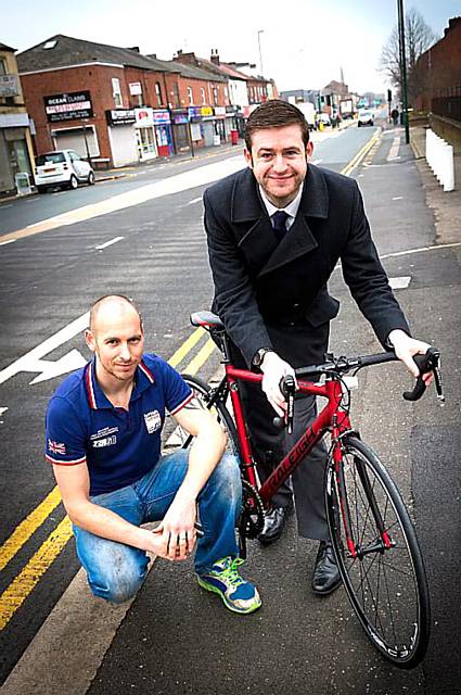 COUNCIL leader Jim McMahon with with TriFit Cycles owner Andy Taylor.