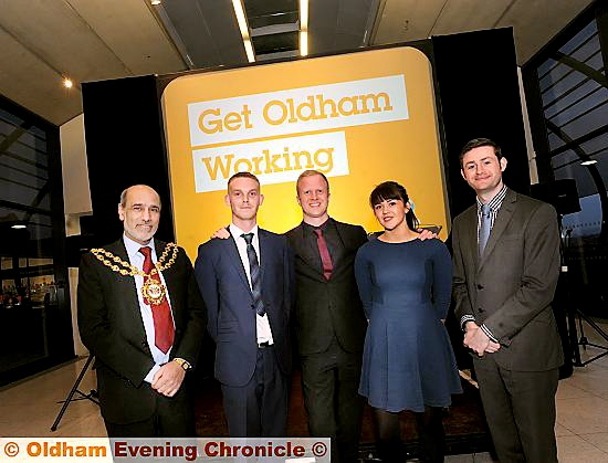 YOU’RE hired: “Apprentice” star Adam Corbally, centre, with, from left, the Mayor of Oldham, Councillor Fida Hussain, Get Oldham Working apprentices Jordan Townsend and Ana Chadwick, and council leader Jim McMahon