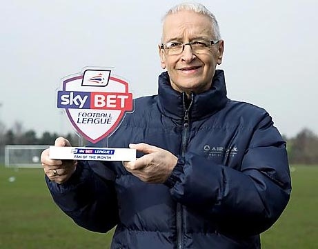 KENNY Jones shows off his fan of the month award.