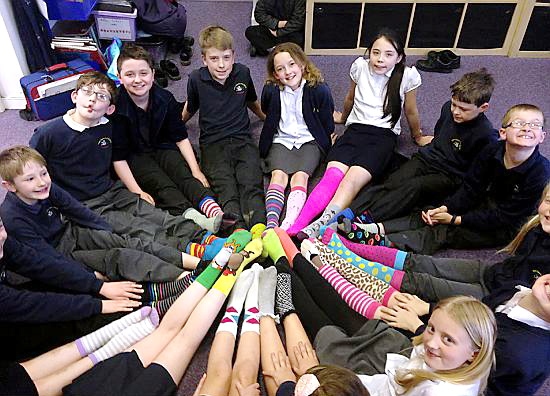 FUNKY socks . . . pupils at Christ Church School show off their fund-raising footwear