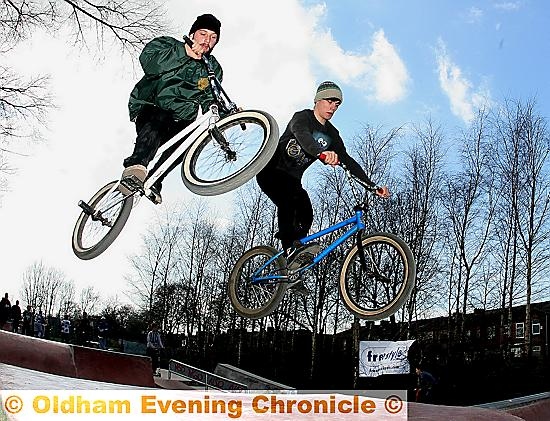 Elliott Hawkins (l) and Luke Birkett try out the new skate park jumps