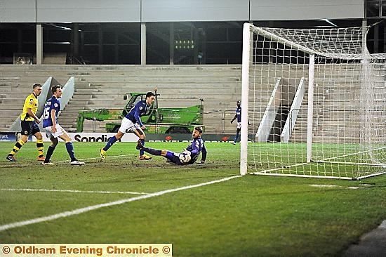 IT’S THERE . . . Rhys Turner slots home his second goal.