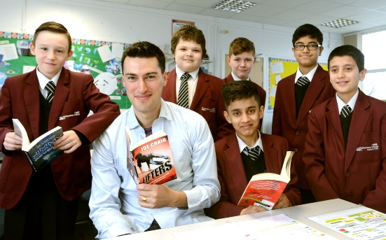 Joe is pictured with pupils, from left, Kai Lawton, Lucas Sukovaty, Corey Thexton, Farqan Ahmed (seated) Farhad Ali and Jamal Khan.