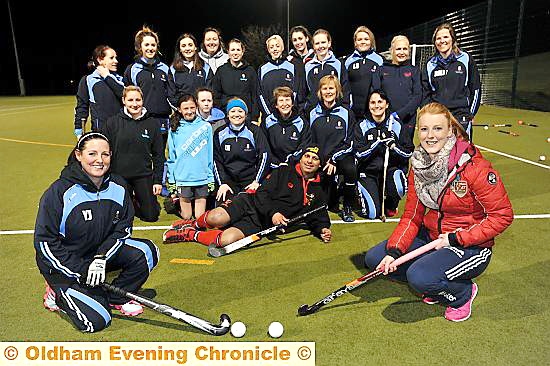 Nicola White (front right) passed on her knowledge to Oldham Hockey Club captain Yvonne Jackson and her team-mates. 