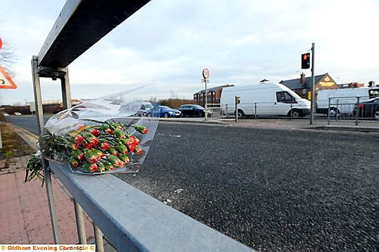 FLOWERS left at the junction by a well-wisher