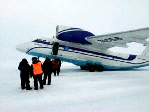 READY TO RUN: Steve and fellow runners board the plane for the Arctic