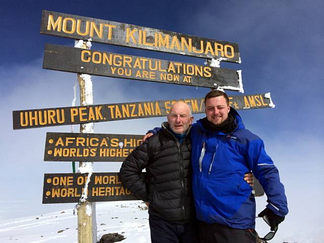 FINALLY there: Frank Rothwell and Ben Ingham reach the summit of Mount Kilimanjaro