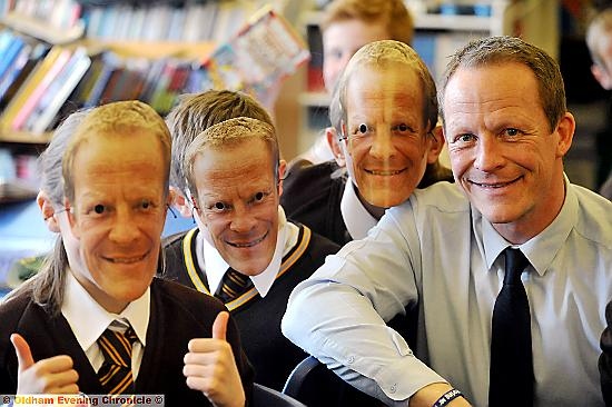 STEVE HILL times four - but only one is the real thing. Pupils wore Mr Hill masks as a tribute to their teacher. PHOTO BY DARREN ROBINSON