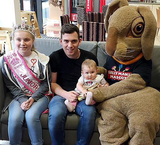 EASTER surprise . . . (from left) Brodie Blackhurst with Jamie Nicholson and his daughter Maya.