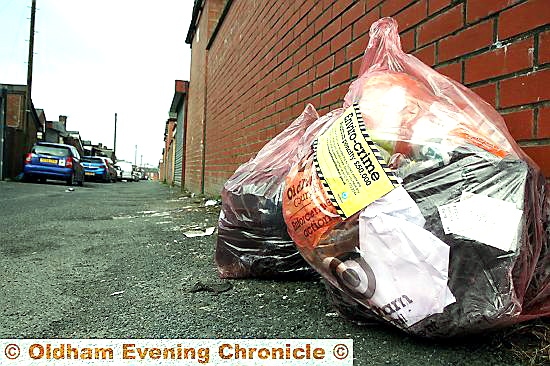 DUMPING ground: waste thrown in a Glodwick alleyway by a bin man
