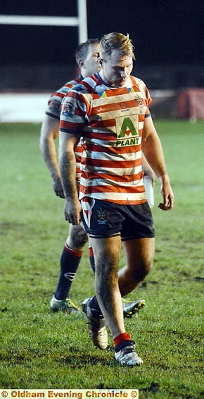 PAIN GAM: head bowed, Danny Langtree leaves the field after last night’s clash at Whitebank. 
