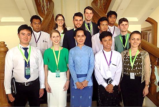 Sam Davys (front, right) with fellow representatives and Aung San Suu Kyi (front, centre), opposition leader and Nobel peace prize winner