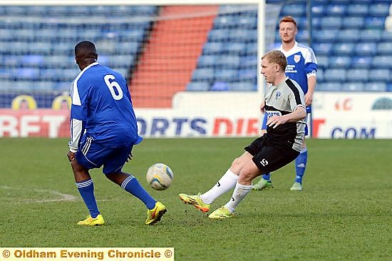 Paul Scholes on the ball for Latics.

