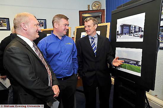 LET’S do business: commercial director Mark Moisley (right) goes over the new stand plans with existing sponsors Mike Flanagan (Spindles and Town Square Shopping Centre) and Wayne Williams (AC Tyres)