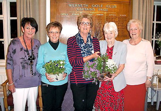 PRIZE TIME . . . Werneth lady captain Kay Broughton (left), Pat Grant, Marianne Pickford, Joyce Beilby and Iris Last.
